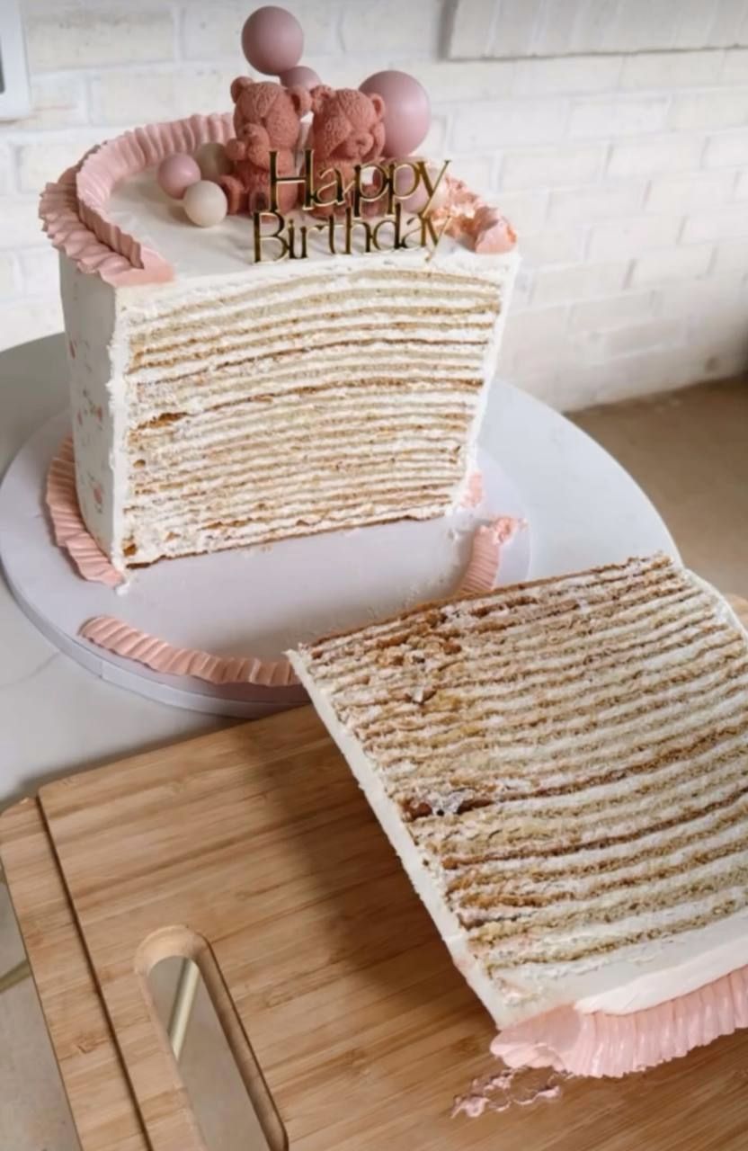 Sliced layer cake showing many thin layers